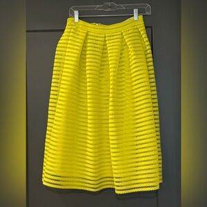 Yellow pleated skirt, never been worn!